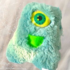 Handmade “Simon the Cyclops” stuffed tooth fairy pillow w/ glowing watchful eye.